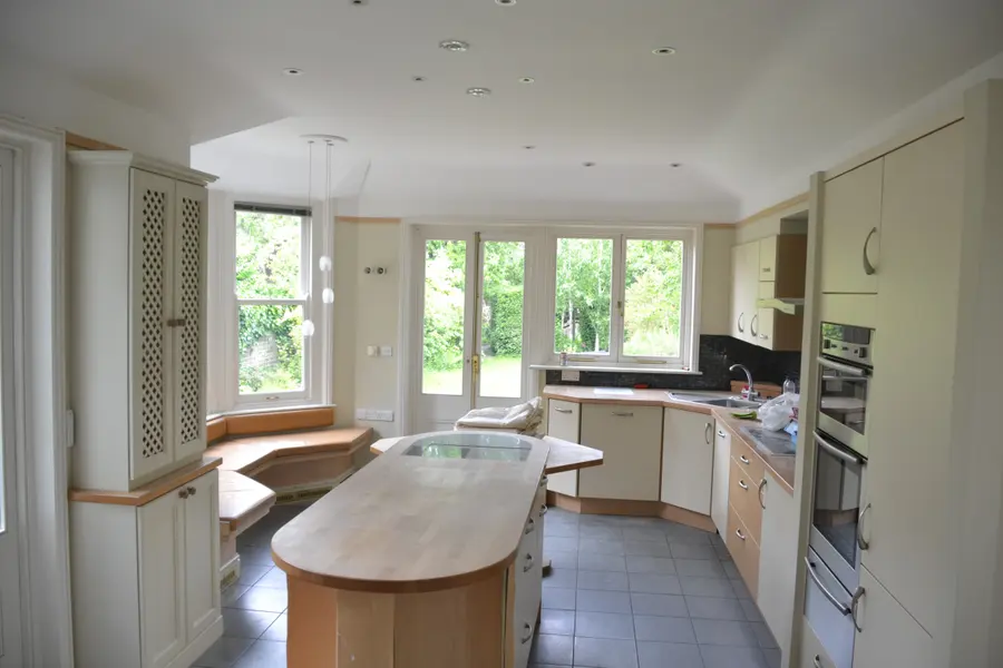 Painted kitchen with island and fitted units
