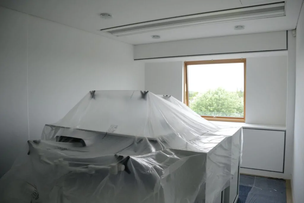 Prep before painting wall in the office