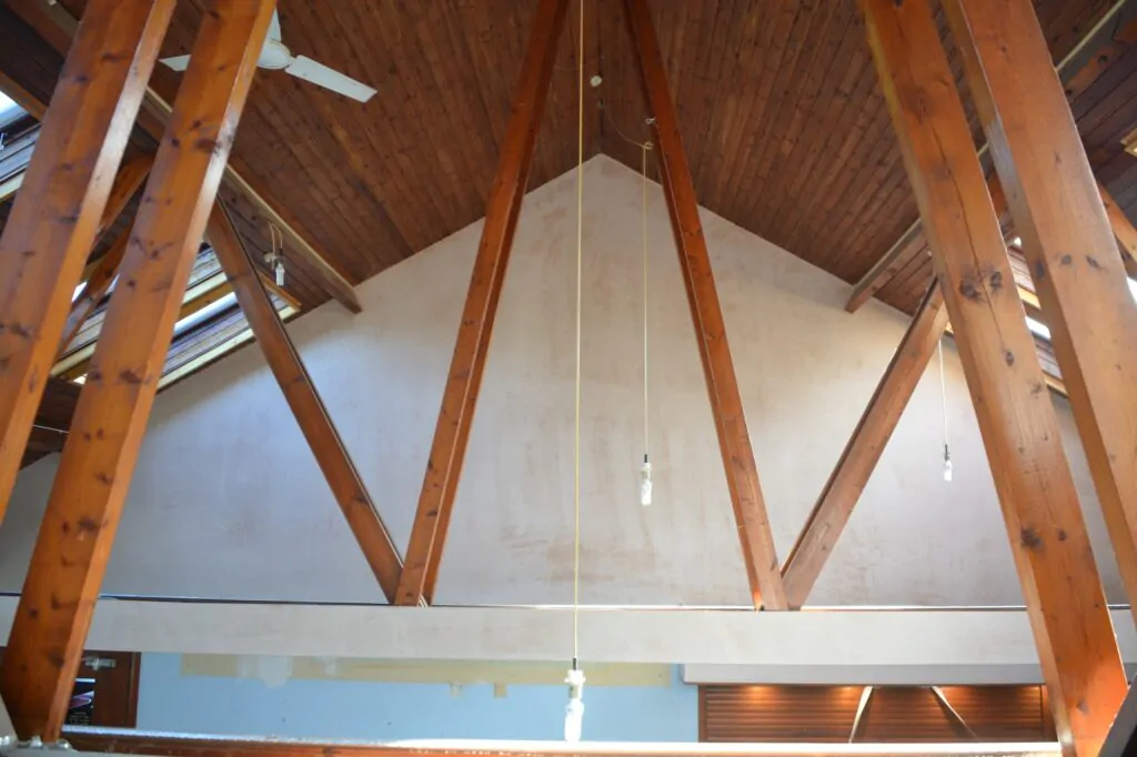 Stained roof supporting beams