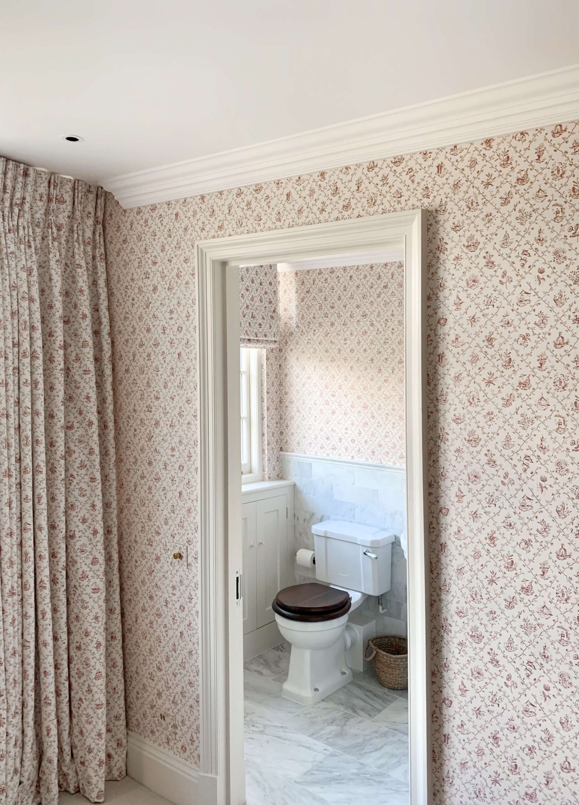 Wallpaper matching curtain pattern